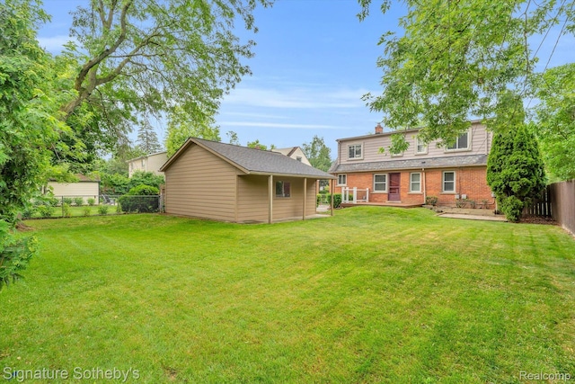 1717 Penistone St, Birmingham, MI 48009 - fenced backyard with an outdoor structure