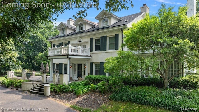777 Kensington Ln, Bloomfield Hills, MI 48304 - view of front of house with a balcony and covered porch