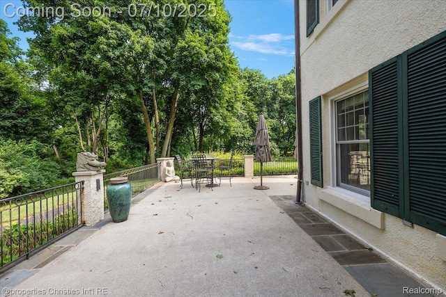 777 Kensington Ln, Bloomfield Hills, MI 48304 - view of patio with view of scattered trees