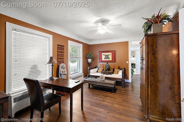 777 Kensington Ln, Bloomfield Hills, MI 48304 - office area with dark wood-style flooring, a textured ceiling, ceiling fan, and radiator heating unit