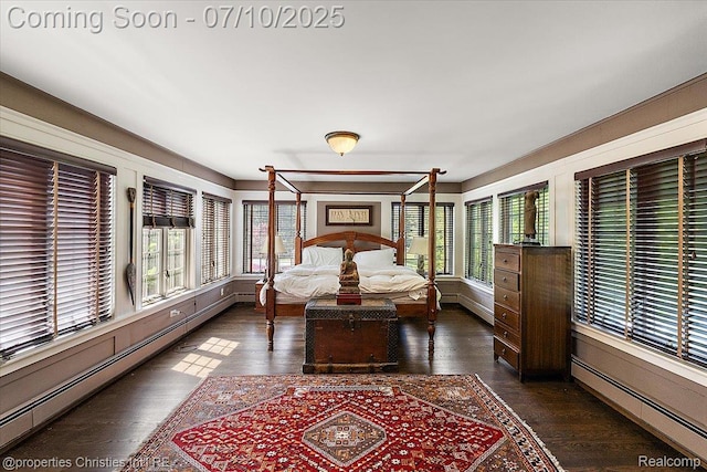 777 Kensington Ln, Bloomfield Hills, MI 48304 - bedroom with a baseboard heating unit and wood finished floors
