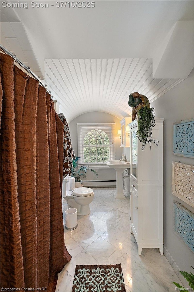 777 Kensington Ln, Bloomfield Hills, MI 48304 - bathroom featuring marble tiled flooring, vaulted ceiling, a bidet, and a tub