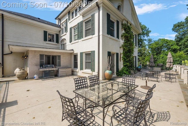 777 Kensington Ln, Bloomfield Hills, MI 48304 - view of patio with grilling area and outdoor dining space