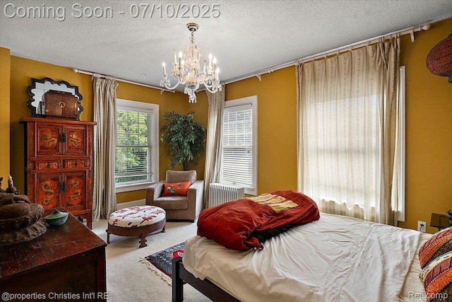 777 Kensington Ln, Bloomfield Hills, MI 48304 - carpeted bedroom featuring a chandelier and a textured ceiling