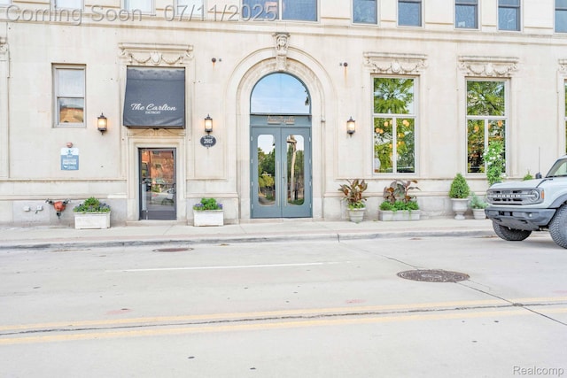 258 Edmund Pl, Detroit, MI 48201 - doorway to property featuring stone siding