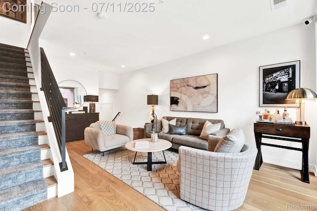 258 Edmund Pl, Detroit, MI 48201 - living room featuring stairway, wood finished floors, and recessed lighting