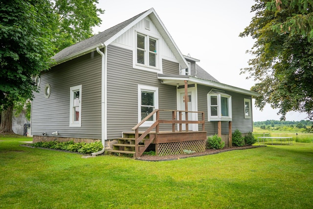 2620 N 184th Ave, Walkerville, MI 49459 - rear view of house featuring a yard and a shingled roof