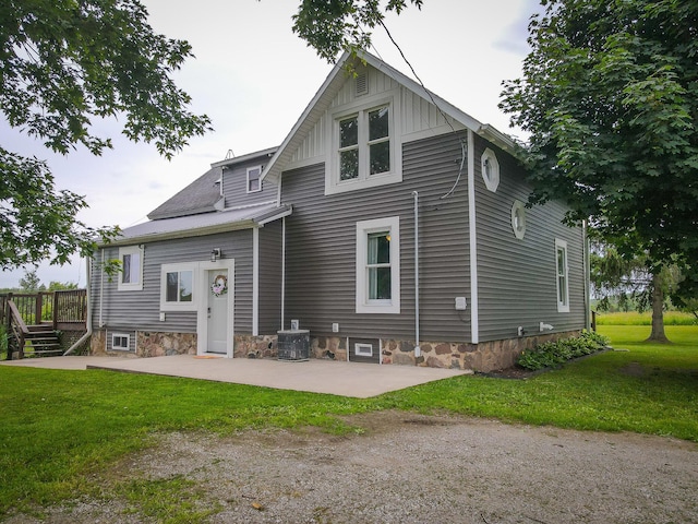 2620 N 184th Ave, Walkerville, MI 49459 - back of house with a patio area and a lawn