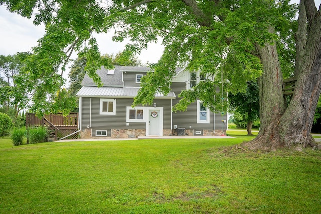 2620 N 184th Ave, Walkerville, MI 49459 - back of house with a lawn, a patio area, and roof with shingles
