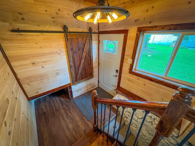 2620 N 184th Ave, Walkerville, MI 49459 - foyer entrance featuring wood finished floors and wooden walls