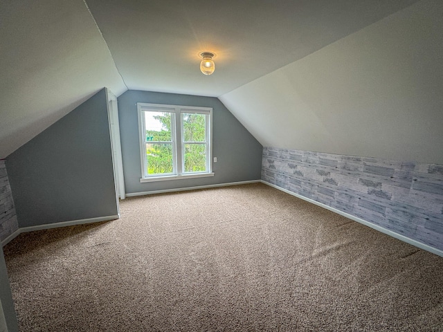 2620 N 184th Ave, Walkerville, MI 49459 - bonus room with wallpapered walls, carpet floors, and lofted ceiling