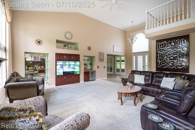 6120 Evanswood Rd, Troy, MI 48085 - carpeted living room featuring high vaulted ceiling, ceiling fan, crown molding, and beverage cooler
