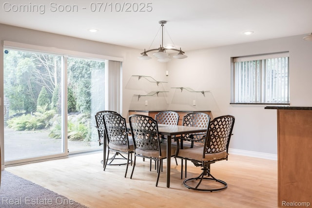 6120 Evanswood Rd, Troy, MI 48085 - dining space featuring light wood-style floors, recessed lighting, and a chandelier