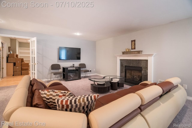 6120 Evanswood Rd, Troy, MI 48085 - carpeted living room featuring a fireplace and recessed lighting