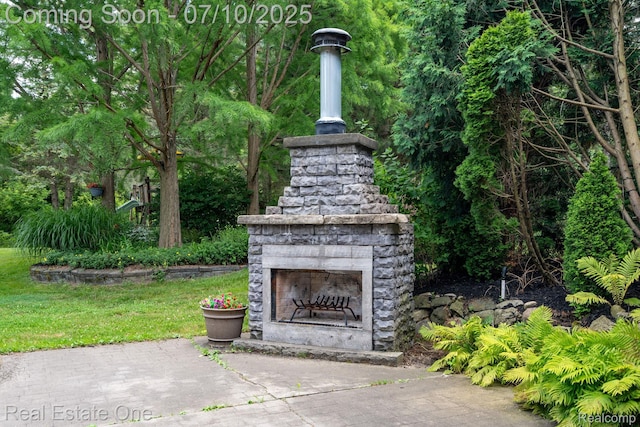6120 Evanswood Rd, Troy, MI 48085 - view of patio featuring an outdoor stone fireplace
