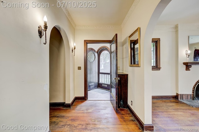 66 Oakdale Blvd, Pleasant Ridge, MI 48069 - entrance foyer with wood finished floors, ornamental molding, and arched walkways