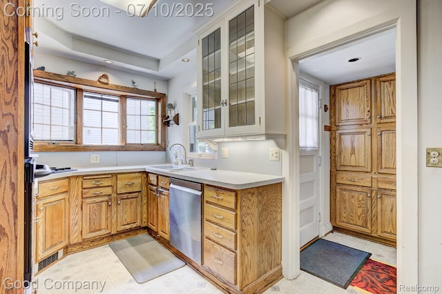 66 Oakdale Blvd, Pleasant Ridge, MI 48069 - kitchen featuring stainless steel dishwasher, glass insert cabinets, light countertops, light tile patterned floors, and recessed lighting