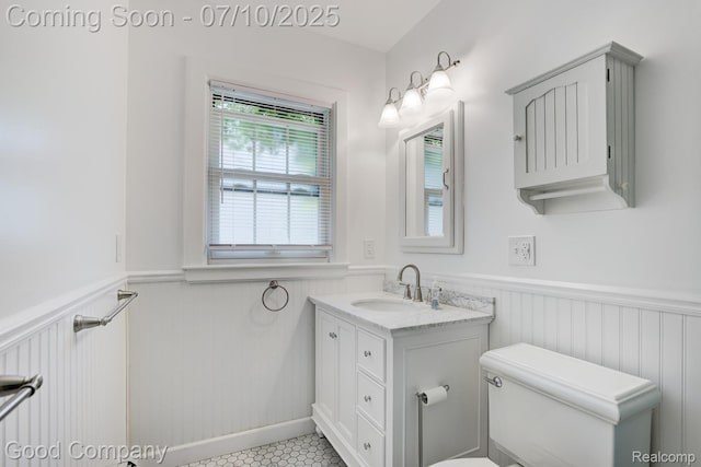 66 Oakdale Blvd, Pleasant Ridge, MI 48069 - bathroom featuring a wainscoted wall and vanity