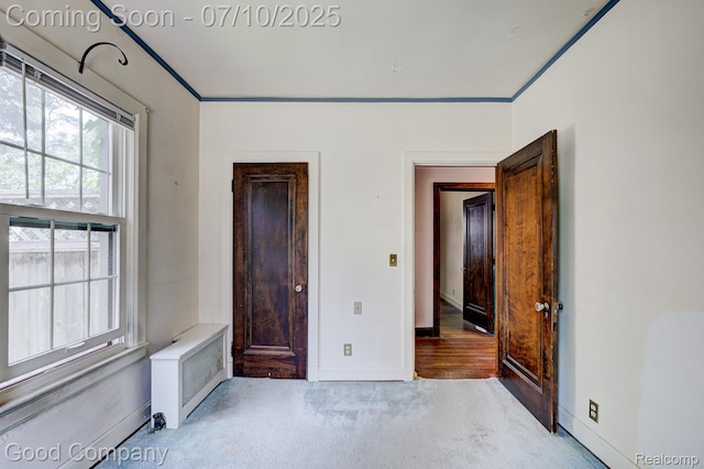 66 Oakdale Blvd, Pleasant Ridge, MI 48069 - unfurnished bedroom with light carpet and ornamental molding
