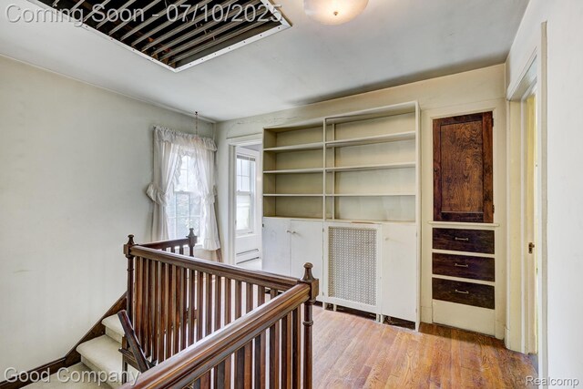 66 Oakdale Blvd, Pleasant Ridge, MI 48069 - hallway with an upstairs landing and wood finished floors
