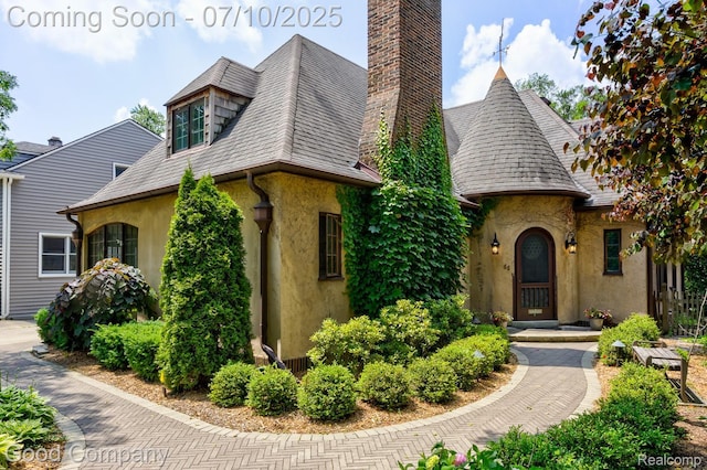 66 Oakdale Blvd, Pleasant Ridge, MI 48069 - tudor house featuring stucco siding and a chimney