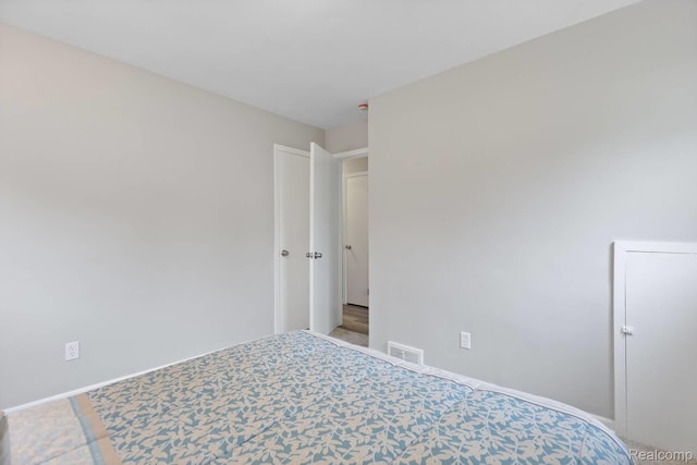 24371 Grove Ave, Eastpointe, MI 48021 - unfurnished bedroom with baseboards