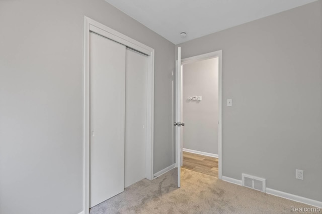 24371 Grove Ave, Eastpointe, MI 48021 - unfurnished bedroom with light carpet and a closet
