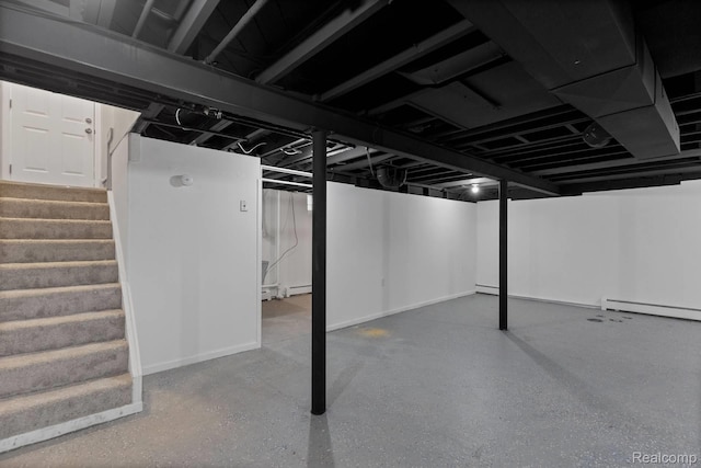 24371 Grove Ave, Eastpointe, MI 48021 - finished basement with stairs and a baseboard radiator