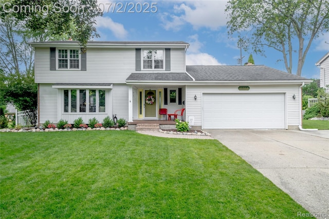 11216 Old Bridge Rd, Grand Blanc, MI 48439 - view of front of property featuring an attached garage, concrete driveway, and a porch