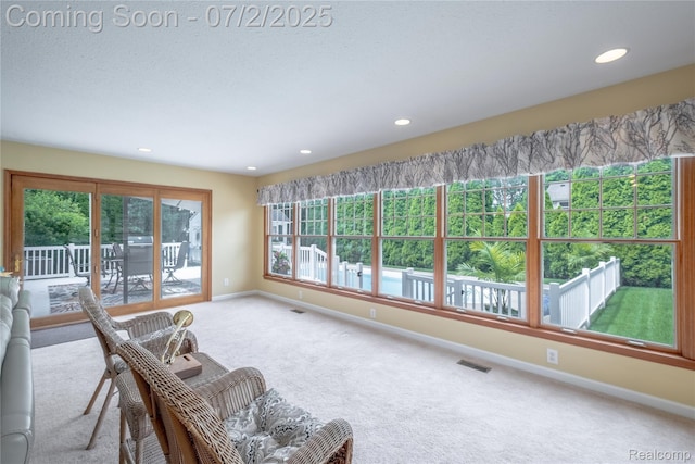 11216 Old Bridge Rd, Grand Blanc, MI 48439 - carpeted living room featuring healthy amount of natural light and recessed lighting