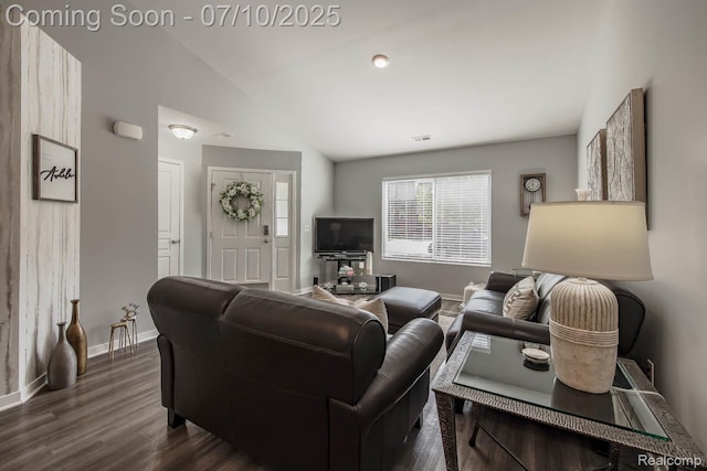2489 Hatchery Crossing Dr, Waterford, MI 48329 - living area with dark wood-type flooring and lofted ceiling