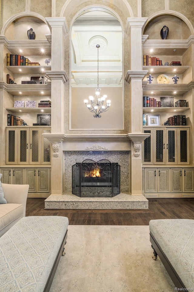 18198 Shelley Pond, Northville, MI 48168 - living area with dark wood-type flooring, a premium fireplace, a chandelier, and ornamental molding