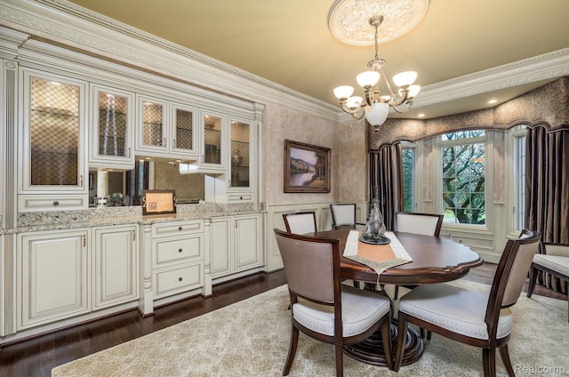 18198 Shelley Pond, Northville, MI 48168 - dining space with a chandelier, crown molding, dark wood-style flooring, and wallpapered walls
