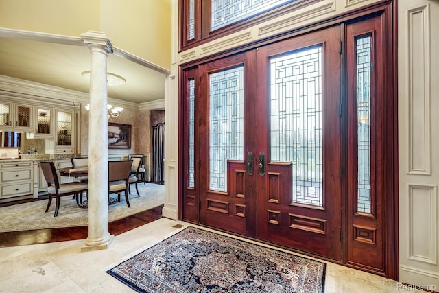18198 Shelley Pond, Northville, MI 48168 - entryway featuring healthy amount of natural light, ornate columns, and ornamental molding