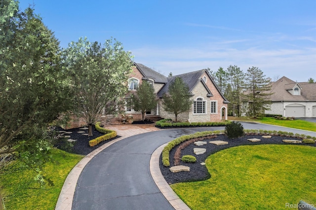 18198 Shelley Pond, Northville, MI 48168 - french country home with stone siding, a front lawn, and curved driveway