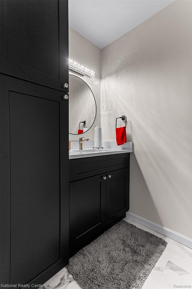 1306 Bishops Ter, Wixom, MI 48393 - bathroom featuring marble finish flooring and vanity
