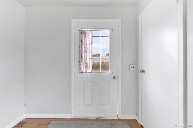 322 Michelson Rd, Rochester Hills, MI 48307 - entryway with baseboards and wood finished floors