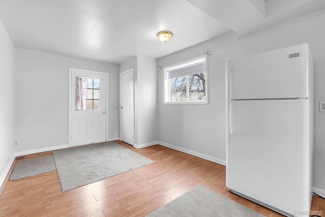 322 Michelson Rd, Rochester Hills, MI 48307 - entrance foyer with baseboards and wood finished floors