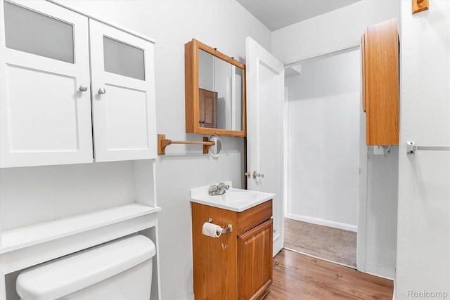 322 Michelson Rd, Rochester Hills, MI 48307 - half bath with vanity and wood finished floors