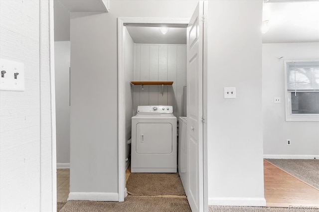 322 Michelson Rd, Rochester Hills, MI 48307 - laundry room featuring washer / clothes dryer and light carpet