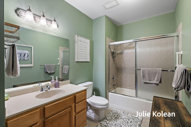 930 Washington Ave Unit 5C, Muskegon, MI 49441 - full bathroom featuring vanity, tile patterned floors, and enclosed tub / shower combo
