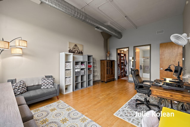 930 Washington Ave Unit 5C, Muskegon, MI 49441 - office space with wood finished floors and a high ceiling