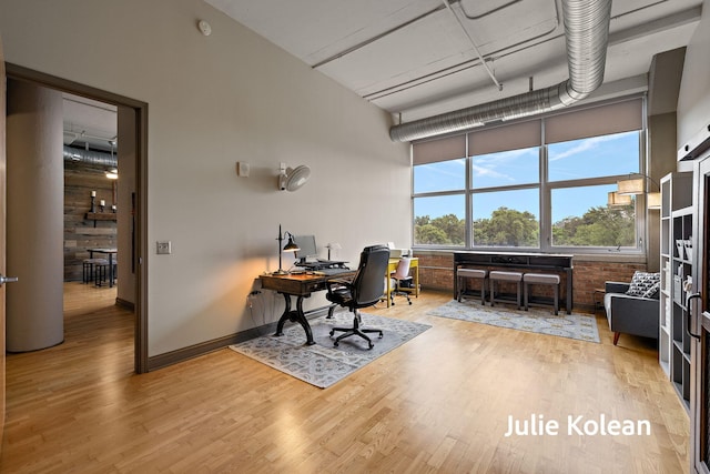 930 Washington Ave Unit 5C, Muskegon, MI 49441 - office with wood finished floors and baseboards