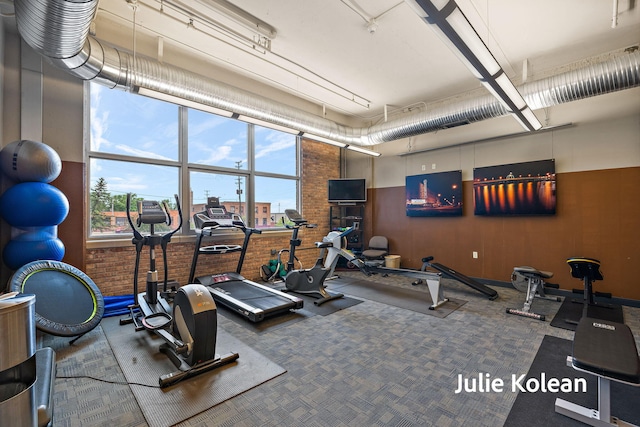 930 Washington Ave Unit 5C, Muskegon, MI 49441 - workout area with carpet floors and a high ceiling