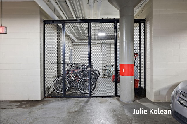 930 Washington Ave Unit 5C, Muskegon, MI 49441 - parking deck with concrete block wall