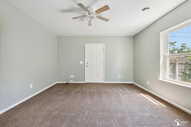 1107 W Temperance Rd, Temperance, MI 48182 - carpeted empty room featuring a ceiling fan and baseboards