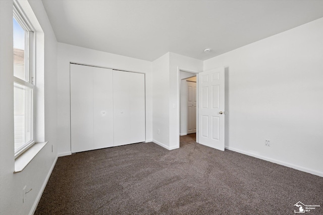 1107 W Temperance Rd, Temperance, MI 48182 - unfurnished bedroom featuring carpet flooring and a closet