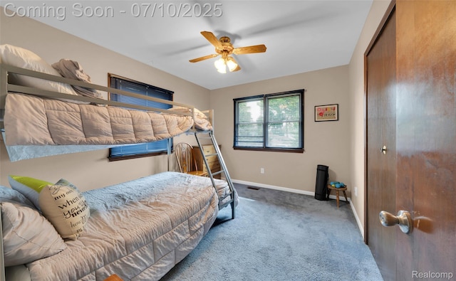 2150 Dunwoodie St, Ortonville, MI 48462 - carpeted bedroom featuring baseboards and a ceiling fan