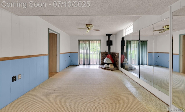 2150 Dunwoodie St, Ortonville, MI 48462 - hall with a textured ceiling and wooden walls