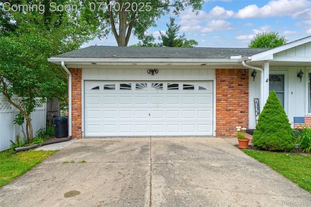 2150 Dunwoodie St, Ortonville, MI 48462 - garage with concrete driveway